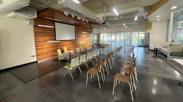 Line of chairs facing a television