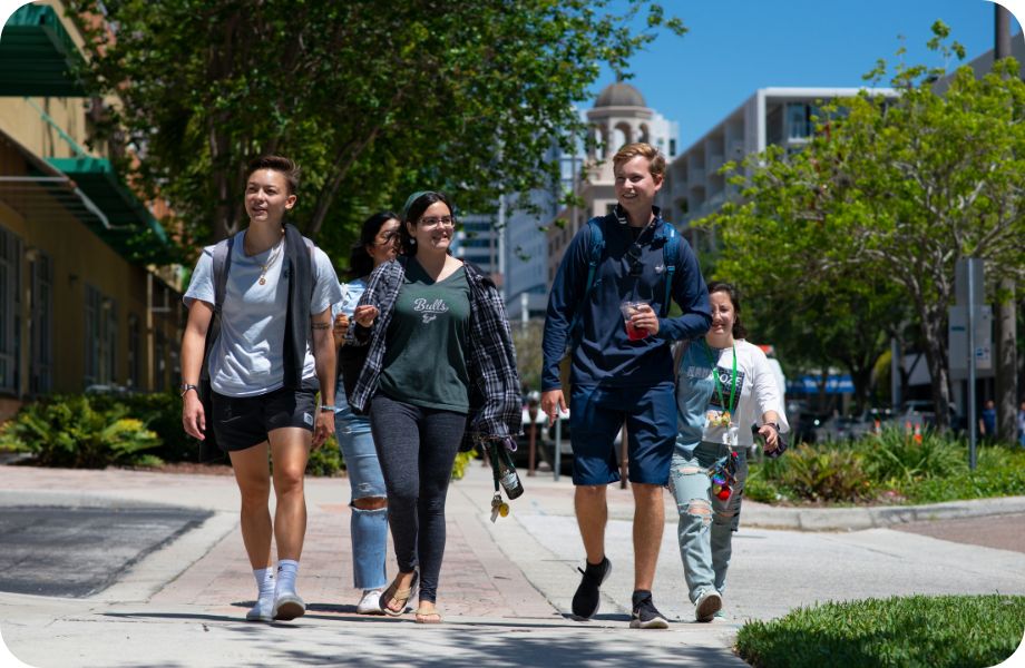 Group of students walking in downtown St. Pete