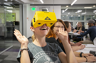 Student looking through virtual reality headset
