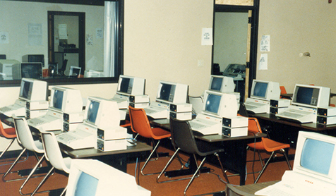 a room full of desktop computers