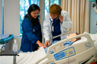 Student praciticing techniques in state-of-the-art simulation lab.