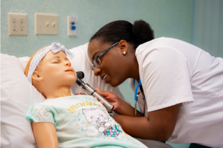 Student praciticing techniques in state-of-the-art simulation lab.