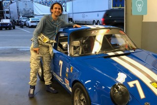 Dante Tornello posing in front of race car