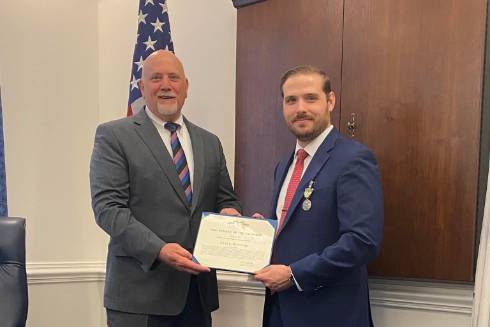 Kyle McIntyre receiving second award as chief of staff