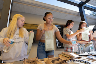 People preparing food for the MRE contest