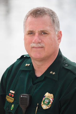 Chief David Hendry wearing uniform looking directly at camera