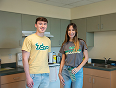 Students in a dorm kitchen area