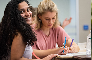 2 female students in class