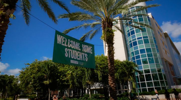 Banner outside that reads "Welcome Home Students"
