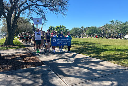 people participating in the suicide parade walk