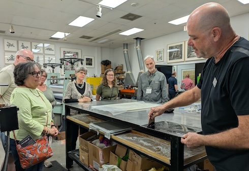 OLLI group learning how to make a print.