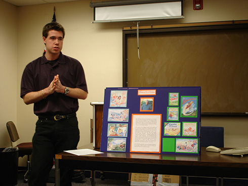 Gevan Peacock giving a presentation in what was then called Coquina Hall, now known as H. William Heller Hall.