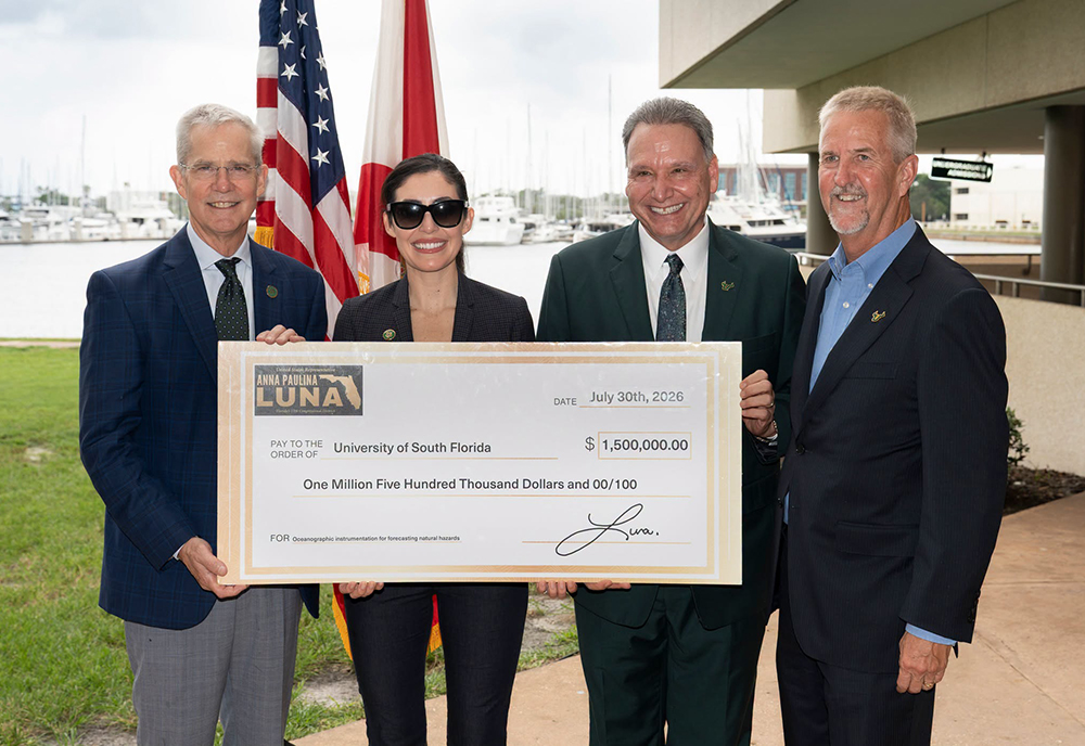 (From left to right) USF St. Petersburg Regional Chancellor Thomas Smith, U.S. Rep. Anna Paulina Luna, USF President Moez Limayem, and College of Marine Science Dean Tom Frazer
