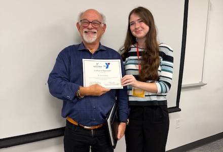 Student writer with speaker