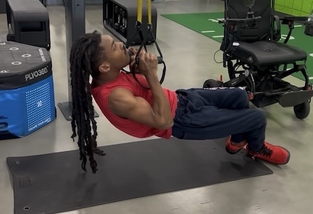 Tyvelle working out in campus gym.