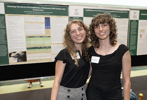 Sisters Haley (left) and Autumn (right) Merkle at the OneUSF Undergraduate Research Conference.