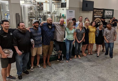 Previous class of brewing arts grads.