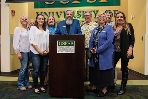 Bob and Susan Churuti pose with members of their family.