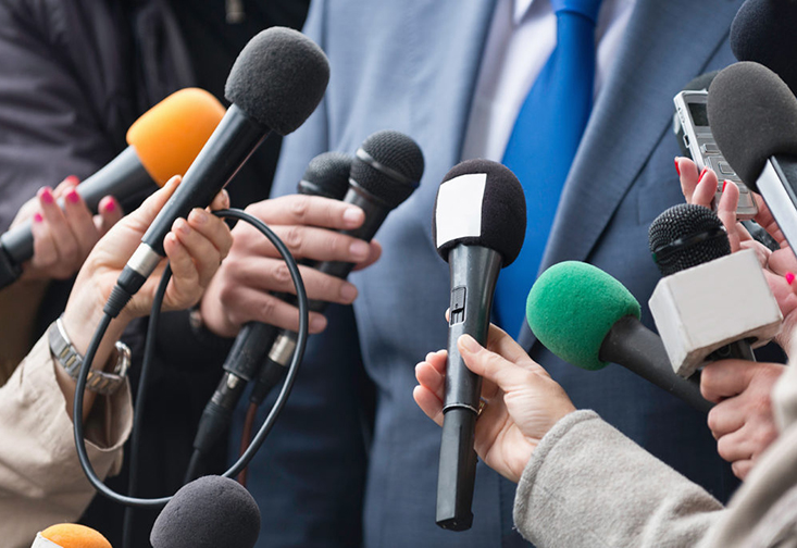 microphones at a press conference