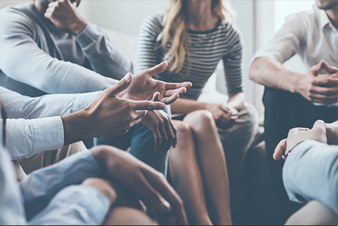 Diverse group of people talking