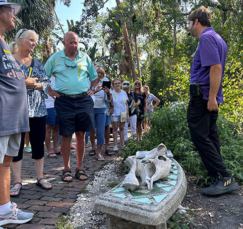 people gathered around listening at the Echoes of the Land event