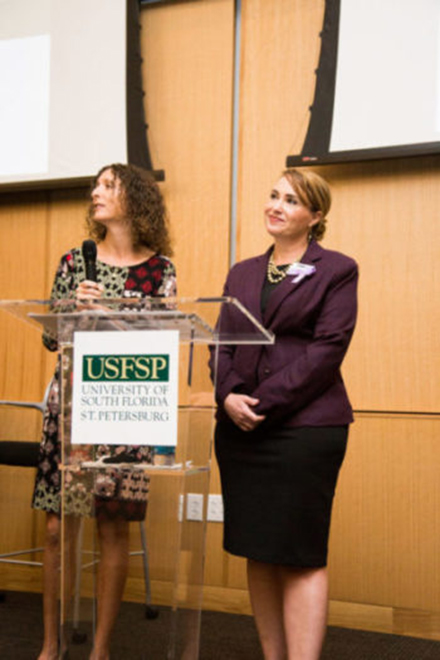 Economics Instructor Rebecca Harris (left) and CASA CEO Lariana Forsythe during a presentation on the new study at USFSP on Nov. 12, 2018.