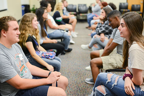 Students participating in the PATHe program get to know one another during an orientation session at St. Petersburg College.