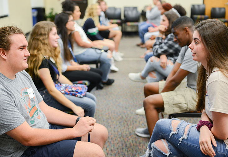 Students participating in the PATHe program get to know one another during an orientation session at St. Petersburg College.