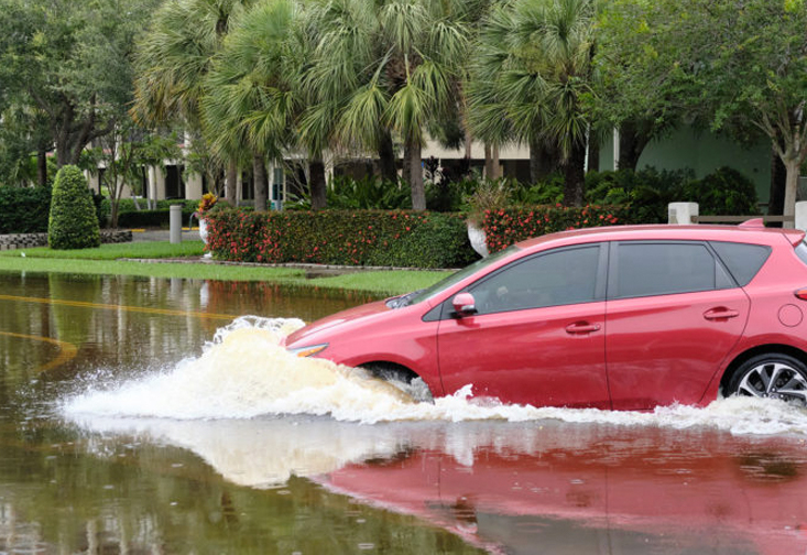 Car driving through water