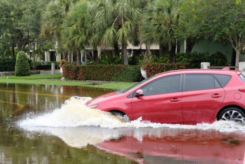 Car driving through water