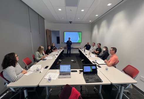 Leaders from employers in environmental science and marine biology convene for one of the industry focus groups.