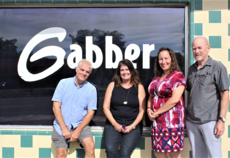 People standing in front of Gabber.