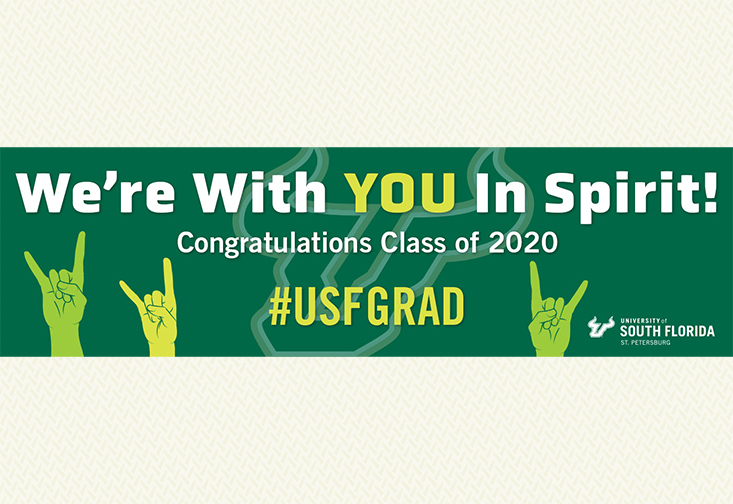 A billboard that says "We're with you in spirit! Congratuations Class of 2020"