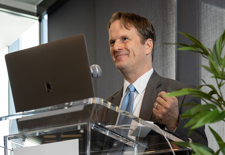 J. Michael Francis standing at a podium