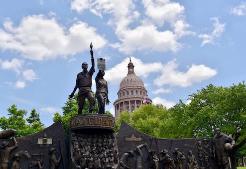 The Texas African American History Memorial accompanied by the words USF celebrates Juneteenth with our community.