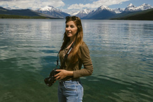 Kelly Stefanski at Glacier National Park capturing stunning landscape and wildlife imagery.