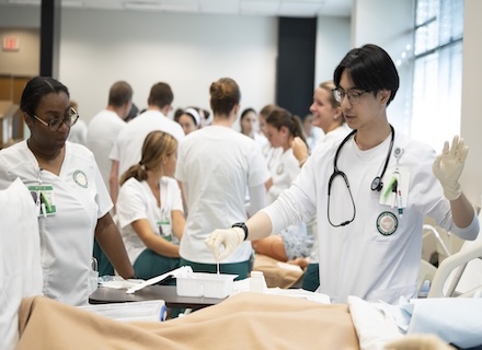 Nursing students in lab.