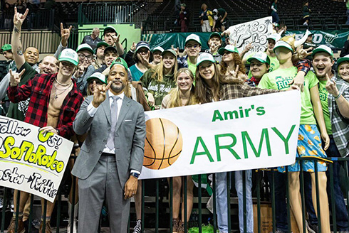 USF men’s basketball coach Amir Abdur-Rahim with USF basketball fans.