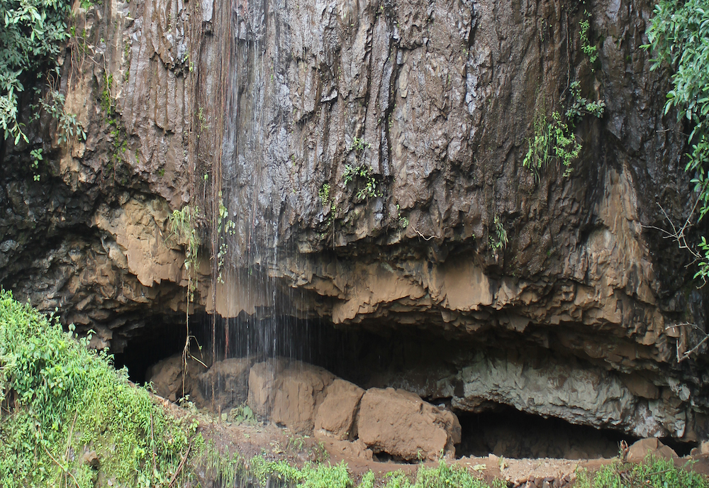 Mota Cave in Ethiopia, where a 4,500-year-old skeleton was discovered by USF Professors John and Kathy Arthur (left and middle) that has helped to outline major demographic shifts in ancient humans.