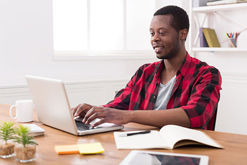 Student working on laptop