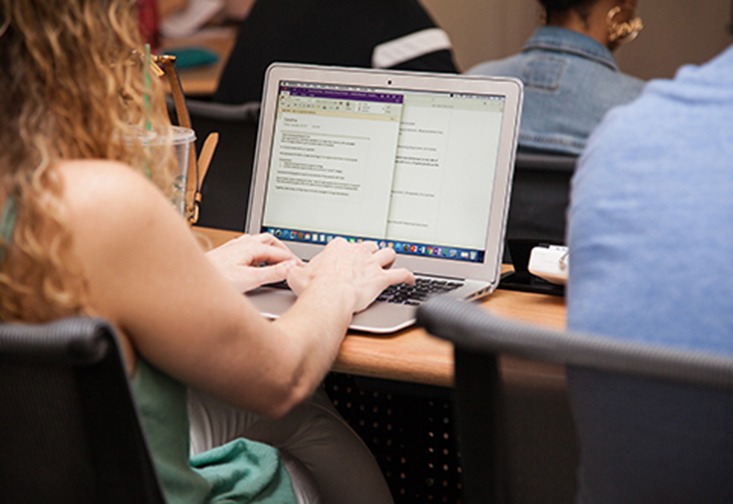 A student working on a laptop