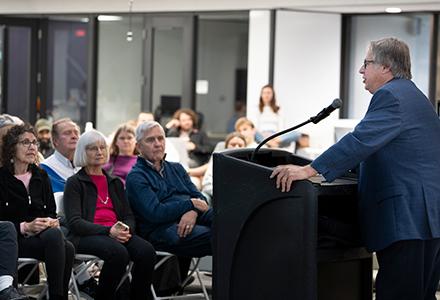 Ray Arsenault speaking to a group of people