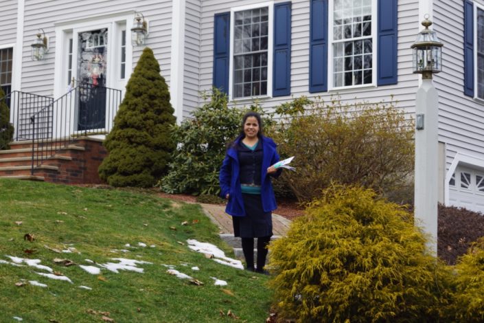 Student canvassing door-to-door