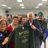 Students posing with President Biden