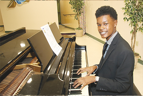 Timothy Garner playing the piano