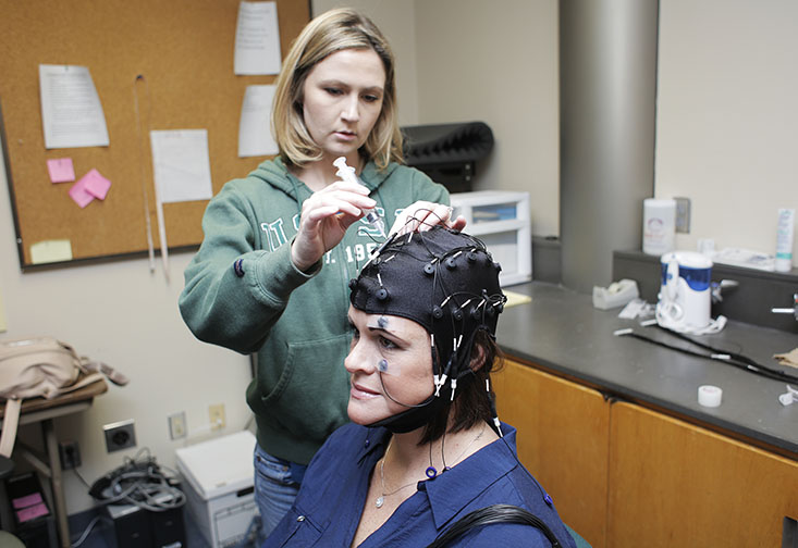 USF St. Petersburg graduate student Jaclyn Dell conducts research in cognitive and physiological psychology.