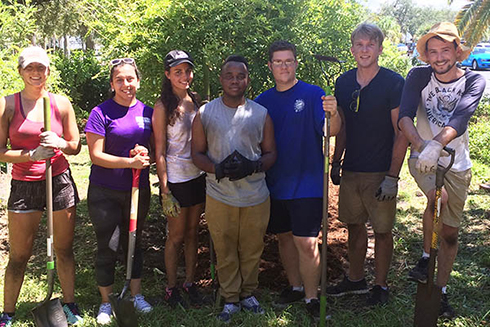 USFSP students working in the butterfly garden on the USFSP campus