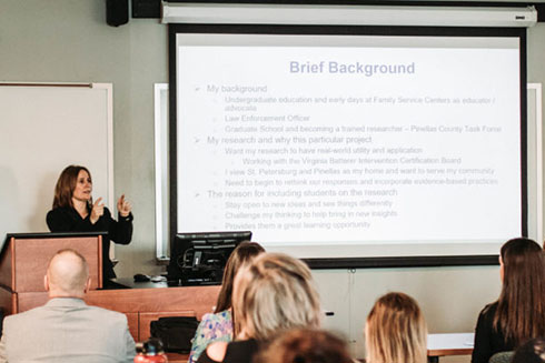 Shelly Wagers presents the results of Rethinking Domestic Violence Cases to members of CASA. Credit: Adam Johnson