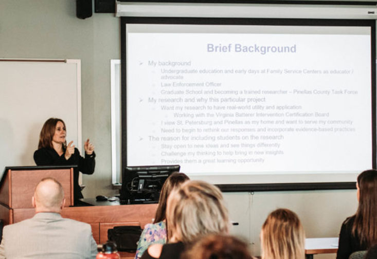 Shelly Wagers presents the results of Rethinking Domestic Violence Cases to members of CASA. Credit: Adam Johnson