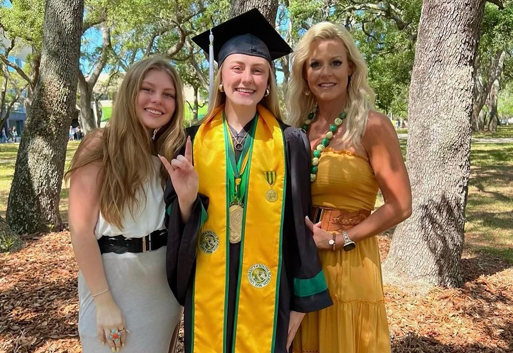Taylor Herman in graduation gown